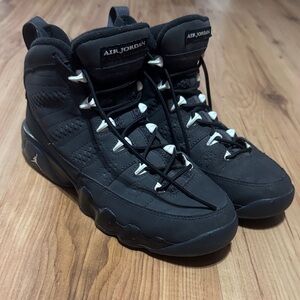 Nike Air Jordan Kids Black Sneakers with White Lace Accents